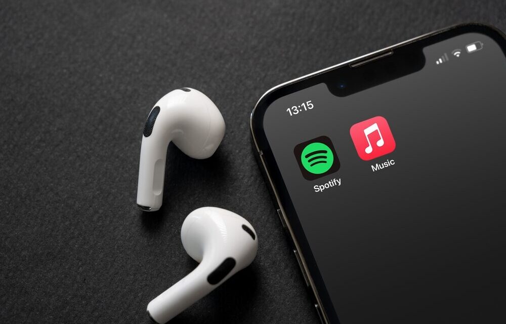 Logo di Apple Music e Spotify